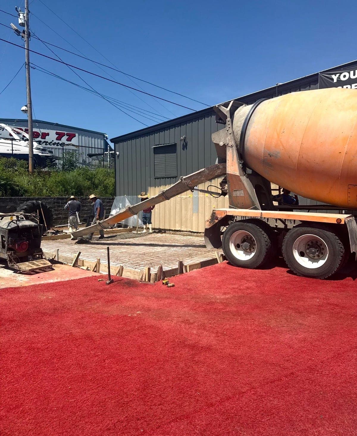 Finished Commercial Concrete job in Charlotte, North Carolina by Local Concrete Contractor — clean control-joint pattern, smooth troweled surface, full property protection during pour.