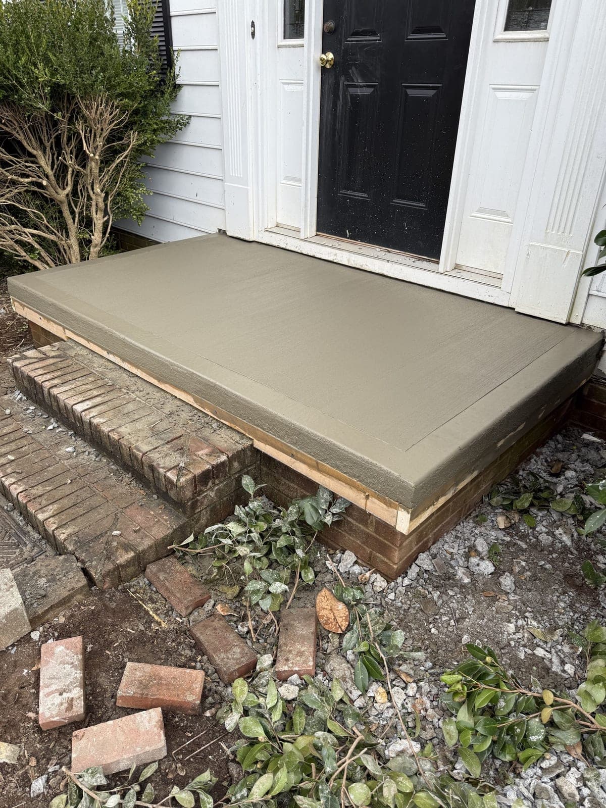 Professional Concrete Porches installation in Charlotte, North Carolina by Local Concrete Contractor — commercial-grade base prep, 6-inch compacted aggregate, expansion joints sawn within 12 hours.