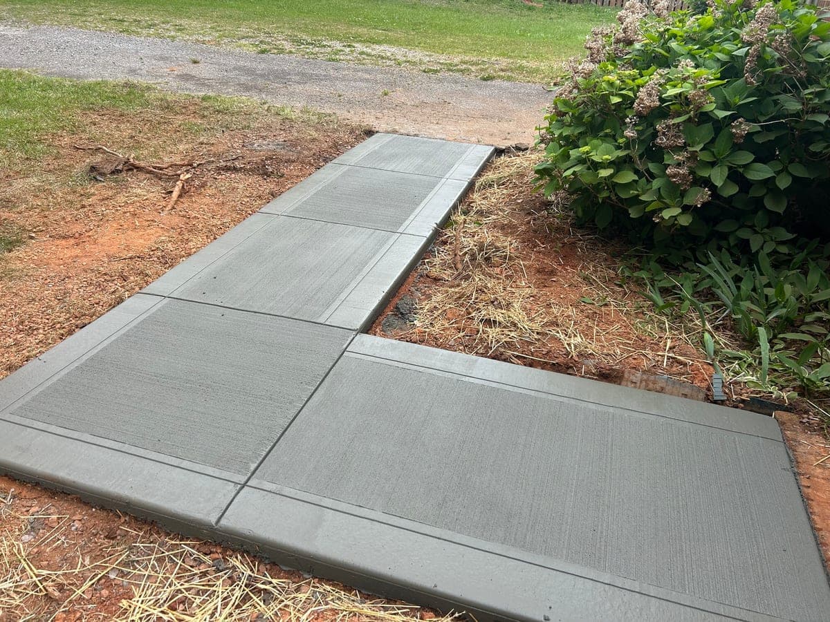 Sidewalk Repair contractor in Kernersville, NC (Forsyth County) — Local Concrete Contractor delivers driveway, patio, foundation, and decorative concrete work across the Carolinas with a 30-year structural standard.