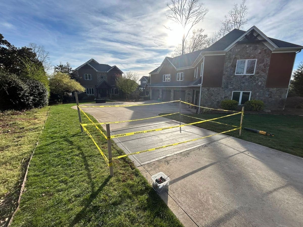 Professional General Driveway Repair installation in South Park, North Carolina by Local Concrete Contractor — commercial-grade base prep, 6-inch compacted aggregate, expansion joints sawn within 12 hours.