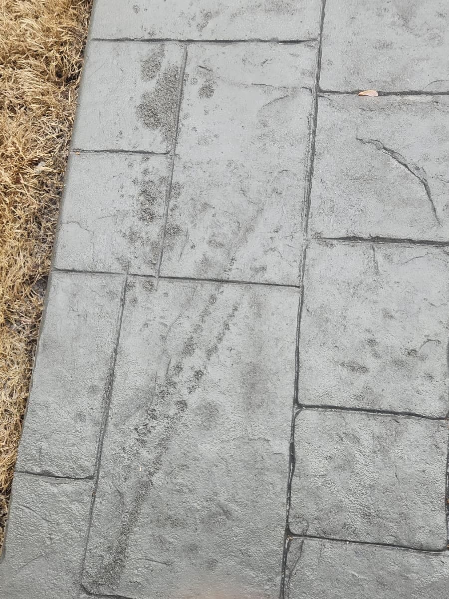 Newly poured Stamped Concrete Repair in South Park, NC (Mecklenburg County) by Local Concrete Contractor — 4000 PSI mix, double-mat #4 rebar, broom-finish surface, 28-day full cure.