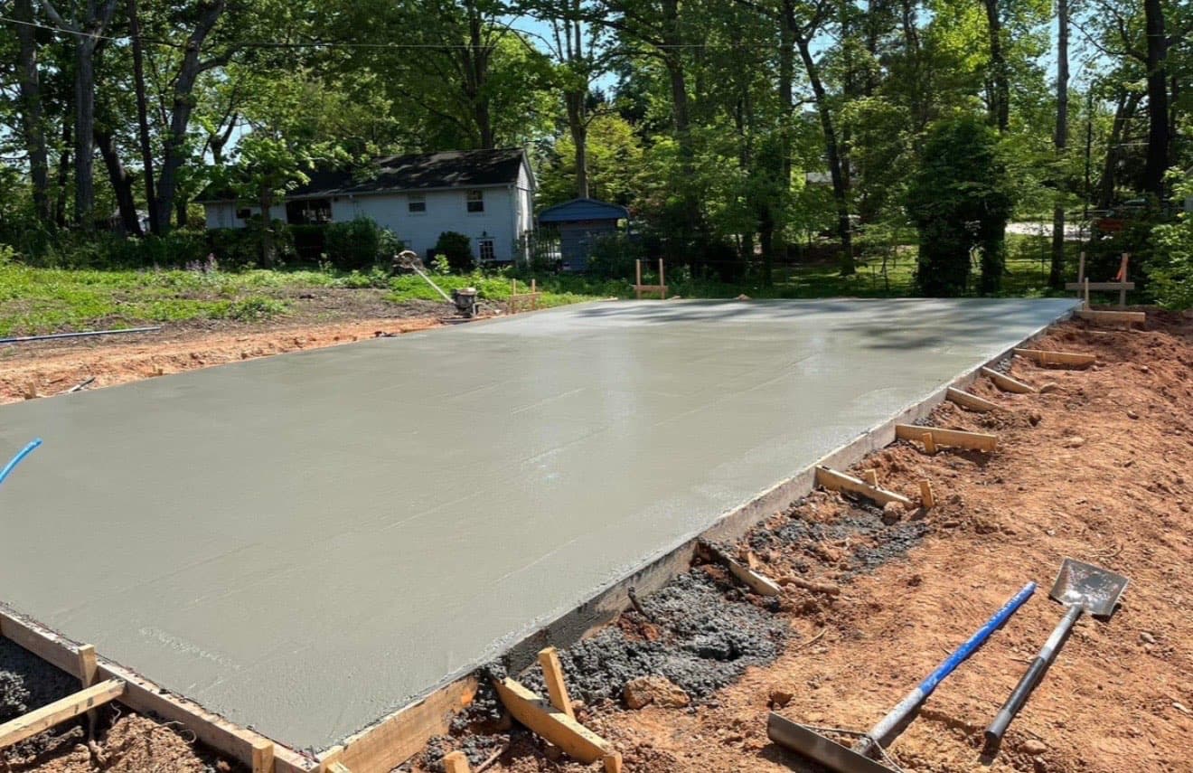 Step 11: Bull Floating in Charlotte, NC concrete project by Local Concrete Contractor