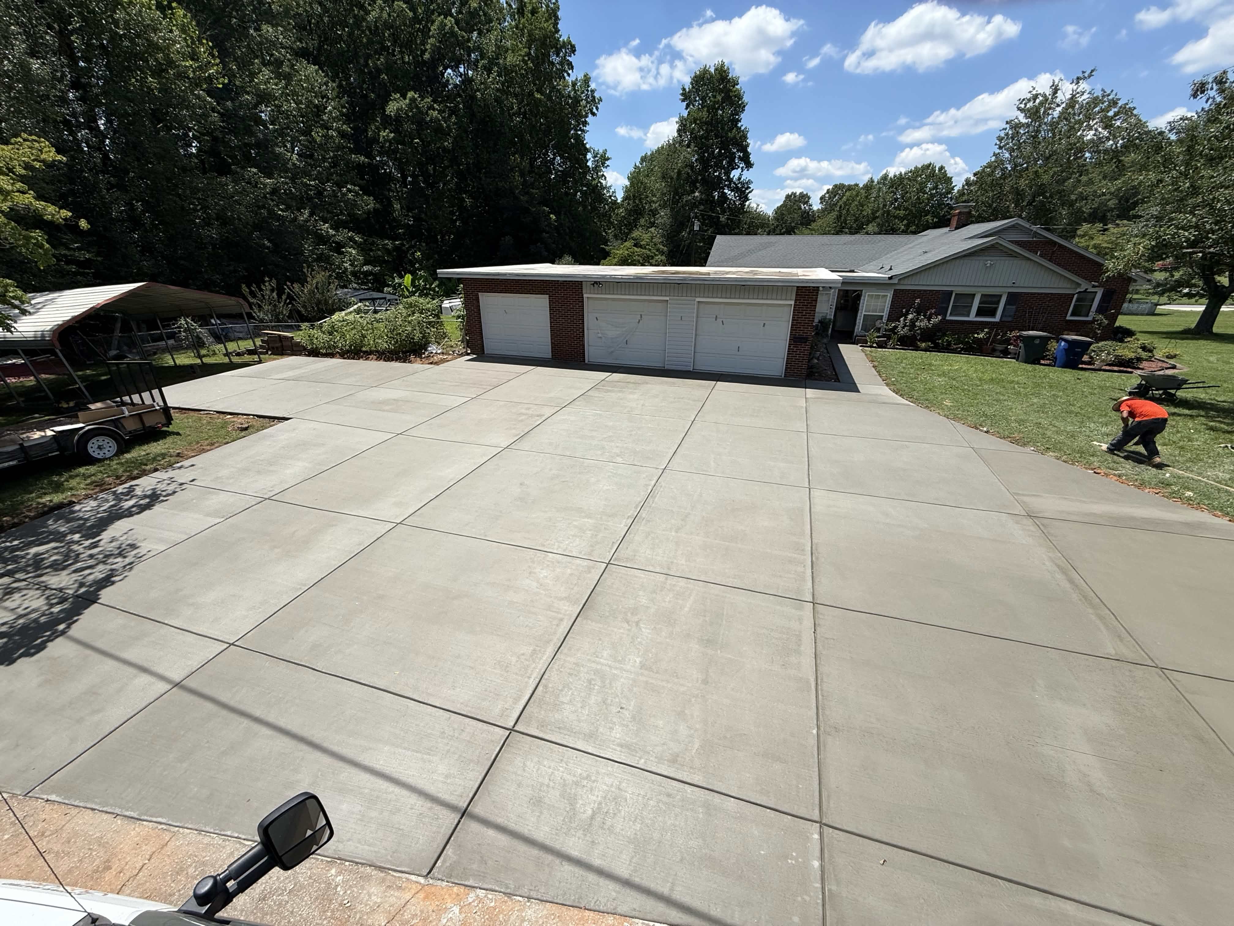Latest project: 3-car residential driveway, broom finish with sawcut control joints